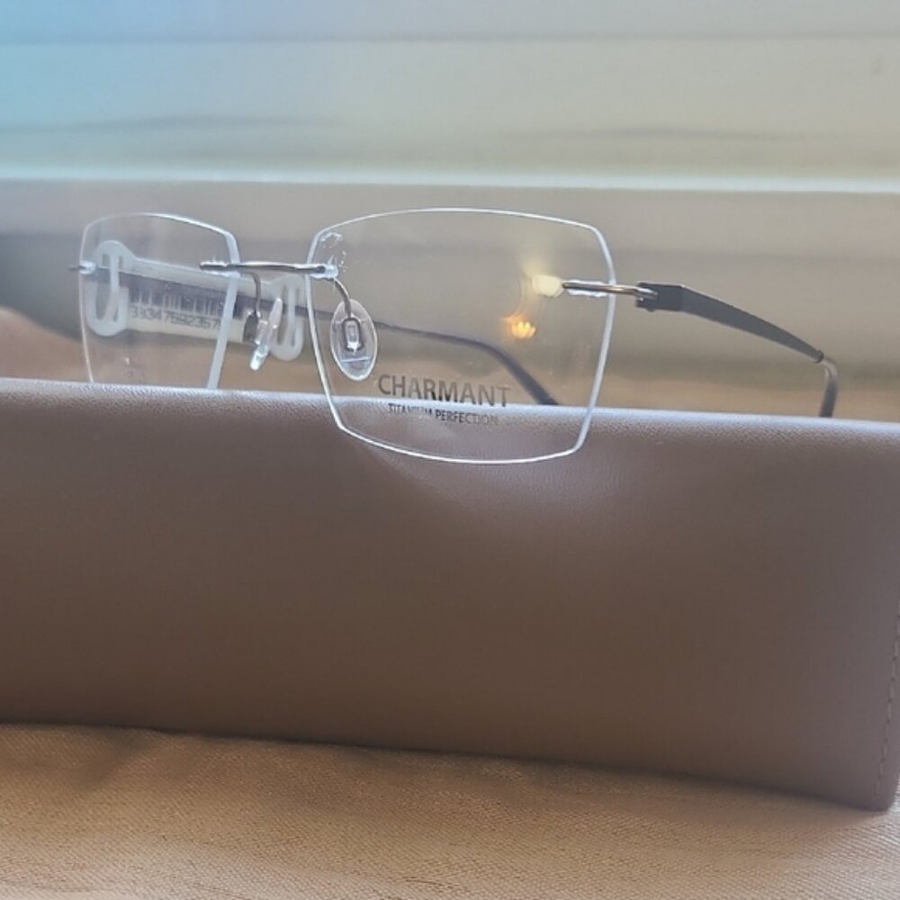 NEW & AUTHENTIC FRAME CHARMANT MODEL CH10973, SIZE 54-18-145, COLOR-95, TITANIUM